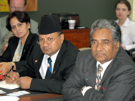 Photo: Members of the Nepal Bar Association listen to discussions at the Forum of Federations offices on August 8, 2007. Left to right:Â Sabita Baral Bhandari, Prealahad Bahadur Karki, and Bishwa Kanta Mainali.